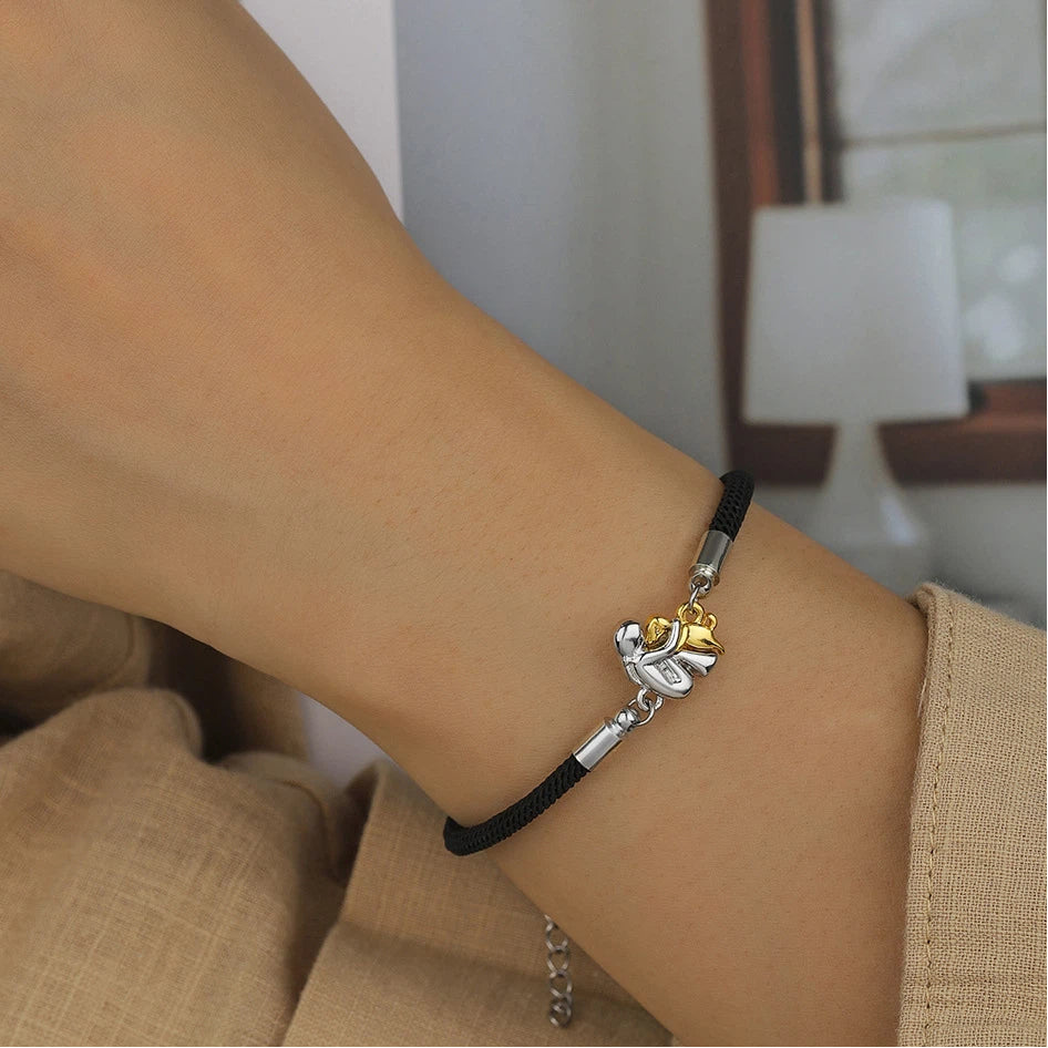 A little girl and a dog embrace earrings